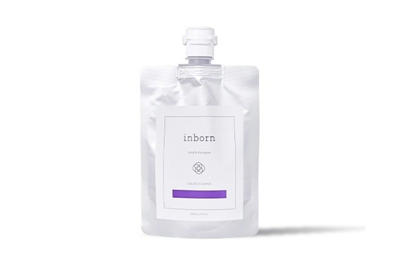 inborn ムラサキシャンプーの白いパウチと紫色の帯が見える正面画像