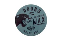 DOORS ワックス マットドライの容器上面（青緑色・黒いパンサーのイラスト）